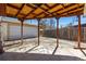 Backyard patio with wooden pergola at 938 Racine St, Aurora, CO 80011