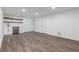 Basement wet bar with custom cabinetry, floating shelves, and wine fridge at 190 Hemlock St, Broomfield, CO 80020