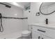 Beautiful bathroom featuring a walk-in shower with subway tile and modern black fixtures at 190 Hemlock St, Broomfield, CO 80020