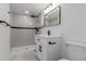 Modern bathroom featuring a walk-in shower with sleek fixtures and a vanity sink at 190 Hemlock St, Broomfield, CO 80020