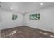 Empty bedroom with wood floors, natural lighting, and neutral paint at 190 Hemlock St, Broomfield, CO 80020