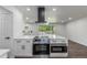Updated kitchen featuring modern appliances, white countertops, and an open layout at 190 Hemlock St, Broomfield, CO 80020