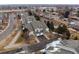 Aerial view of townhouses in a well-maintained community with tree-lined streets and easy access to amenities at 4674 Flower St, Wheat Ridge, CO 80033