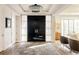 Bright and spacious entryway with black double doors and a large rug at 335 Clayton St, Denver, CO 80206