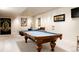 Basement game room with a classic pool table at 335 Clayton St, Denver, CO 80206