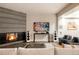 Cozy Gathering room with a fireplace, built-in media console and comfortable seating at 335 Clayton St, Denver, CO 80206