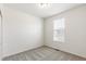 Bedroom features soft carpet and a bright window for ample natural light at 2098 Peachleaf Loop, Castle Rock, CO 80108