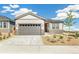 Charming single-story home featuring a two-car garage and a well-manicured front yard at 2098 Peachleaf Loop, Castle Rock, CO 80108