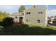 View of the backyard featuring a two-story home with a wooden deck at 6815 Hills Dr, Parker, CO 80138