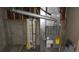 Utility room featuring a furnace and water heater at 6815 Hills Dr, Parker, CO 80138