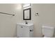 The bathroom has a vanity, mirror and bathtub. The walls are painted in a neutral tone at 14308 E Whitaker Pl # 114, Aurora, CO 80015