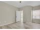 Spacious primary bedroom provides a comfortable retreat with natural light and ample closet space at 14308 E Whitaker Pl # 114, Aurora, CO 80015