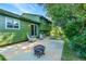 Patio area features outdoor seating and a fire pit with views of the home's backyard at 2211 Sherman St, Longmont, CO 80501