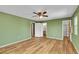 Large bedroom with wood flooring and multiple entryways at 2211 Sherman St, Longmont, CO 80501