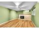 Empty living room with wood floors and a traditional fireplace at 2211 Sherman St, Longmont, CO 80501