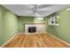 Bright living room with wood floors and a traditional fireplace at 2211 Sherman St, Longmont, CO 80501