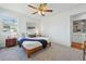 Spacious bedroom with bright windows, plush carpeting, and ample natural light at 4740 Milwaukee St, Denver, CO 80216