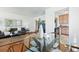 Open dining area with hardwood floors, stylish furniture, and easy access to the kitchen at 4740 Milwaukee St, Denver, CO 80216