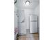 Functional laundry area equipped with washer, dryer, and refrigerator at 4740 Milwaukee St, Denver, CO 80216