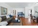 Bright living room with hardwood floors, modern furnishings, and an open layout at 4740 Milwaukee St, Denver, CO 80216
