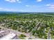 Wide aerial shot capturing the residential neighborhood with tree-lined streets and well-maintained homes at 3278 S Forest St, Denver, CO 80222