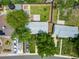 Aerial view of the home showcasing the landscaped yard, patio area, and the surrounding neighborhood at 3278 S Forest St, Denver, CO 80222