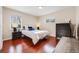 Bedroom with hardwood floors and large windows at 3278 S Forest St, Denver, CO 80222