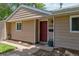 Inviting entrance with a red front door, well-manicured landscaping, and clear house number at 3278 S Forest St, Denver, CO 80222