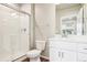 Bathroom featuring a modern vanity, a tiled walk-in shower, and new fixtures at 11142 Bella Vita Dr, Broomfield, CO 80020