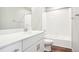 The bathroom features a vanity with white countertops, modern fixtures, and a combined bathtub and shower at 11142 Bella Vita Dr, Broomfield, CO 80020