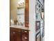 Bathroom vanity with granite countertop and decorative mirror at 543 N Marion St, Denver, CO 80218