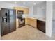 A well-lit kitchen features modern appliances and plenty of counter space at 10699 Butte Dr, Longmont, CO 80504