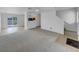 Open floorplan with cozy living area and an adjoining eat-in kitchen at 10699 Butte Dr, Longmont, CO 80504