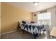 Bedroom with natural light, neutral carpet and a window with blinds at 3659 Makley Cir, Castle Rock, CO 80104