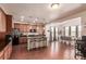 Open-concept kitchen with stainless steel appliances and adjacent dining area at 3659 Makley Cir, Castle Rock, CO 80104