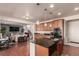 Kitchen and living area with hardwood floors at 3659 Makley Cir, Castle Rock, CO 80104