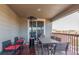 Cozy covered patio with a dining set, heater, and outdoor seating perfect for entertaining and enjoying the views at 3659 Makley Cir, Castle Rock, CO 80104