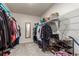 Spacious walk-in closet with shelving and ample storage for clothing, shoes and accessories at 3659 Makley Cir, Castle Rock, CO 80104