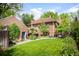 Sprawling backyard with a lush lawn and mature landscaping at 615 N Williams St, Denver, CO 80218