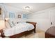 Cozy bedroom features hardwood floors and traditional finishes at 615 N Williams St, Denver, CO 80218