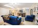Inviting living room features fireplace and comfortable blue furnishings at 615 N Williams St, Denver, CO 80218