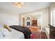 Primary suite with a fireplace, walk-in closets and a sitting area at 615 N Williams St, Denver, CO 80218