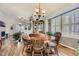 Welcoming dining room with a hardwood floor, complemented by ample natural light at 20040 E Doane Dr, Aurora, CO 80013