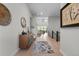 Welcoming foyer with stylish decor, leading to the home's interior at 10869 Bluffside Dr, Lone Tree, CO 80124