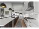 Modern kitchen with a spacious island, stainless steel appliances, and sleek finishes at 10869 Bluffside Dr, Lone Tree, CO 80124