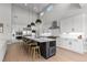 Gourmet kitchen features a large island, stainless appliances, and ample cabinet space at 10869 Bluffside Dr, Lone Tree, CO 80124