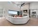 Bright and airy living room with a fireplace, and scenic mountain views at 10869 Bluffside Dr, Lone Tree, CO 80124
