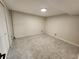 Unfinished basement room with neutral carpeting at 8318 Benton Way, Arvada, CO 80003