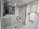 Modern bathroom with a large walk-in shower at 8318 Benton Way, Arvada, CO 80003