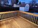 Wooden deck with access to the backyard and shed at 8318 Benton Way, Arvada, CO 80003